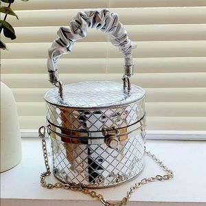 Silver mini quilted bucket hand bag